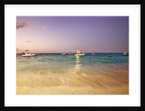 Beach and fishing boats on sea, Bavaro, Dominican Republic by Anonymous