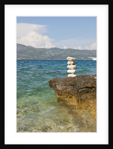 Stack of pebbles on cliff, Lumbarda, Korcula island, Croatia by Anonymous
