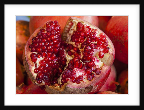 Pomegranates in Carmel Market by Anonymous