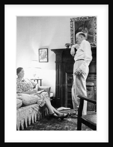 Senior man and woman in the living room, ca. 1935 by Anonymous