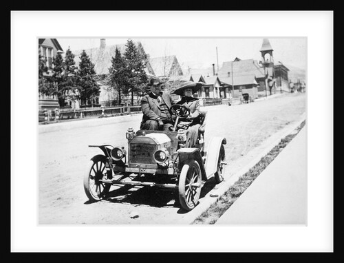 Mature couple in a car, ca. 1910 by Anonymous