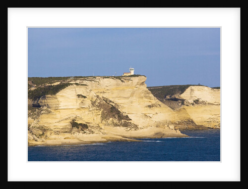 Lighthouse on coast near town, Boniface, Corsica, France by Anonymous