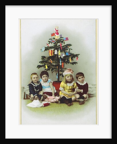 Four children sitting in front of Christmas Tree by Anonymous