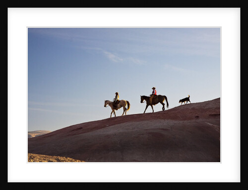 Cowgirls and dogs along the ridge of The Painted Hills by Anonymous