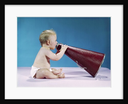 1960s Profile Of Seated Baby Shouting Yelling Speaking Into Big Megaphone by Anonymous