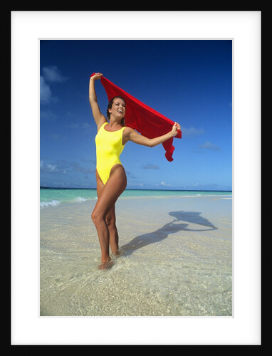 1990s Woman In Yellow Bathing Suit Holding Windblown Red Cloth Mopion Island, Grenadines, West Indies by Anonymous