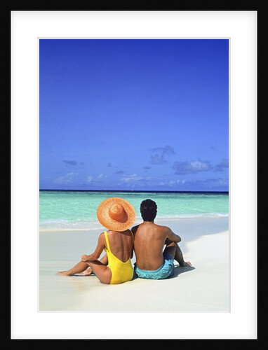 1990s Man And Woman Sitting On The Beach Facing The Water Mopion Island, Grenadines, West Indies by Anonymous