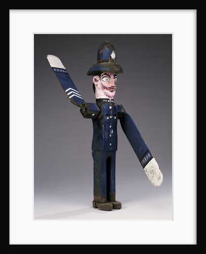 A polychrome wood and metal whirligig modelled as a police sergeant by Anonymous