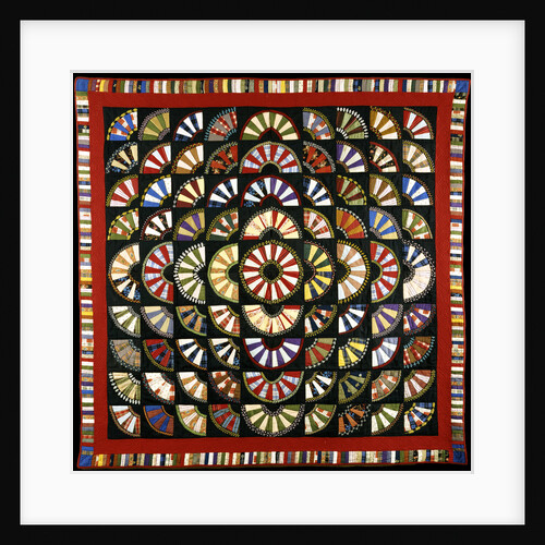 A pieced cotton quilted coverlet by Anonymous