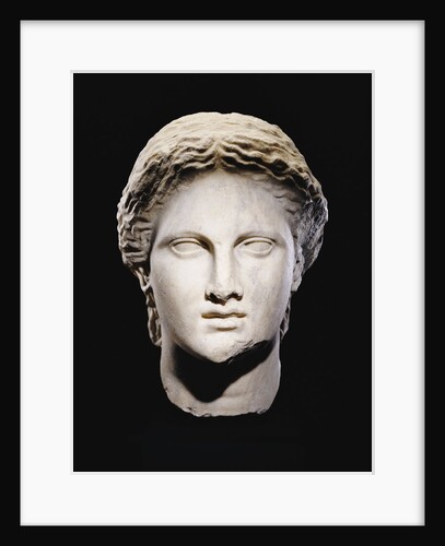 A Greek marble female head by Anonymous