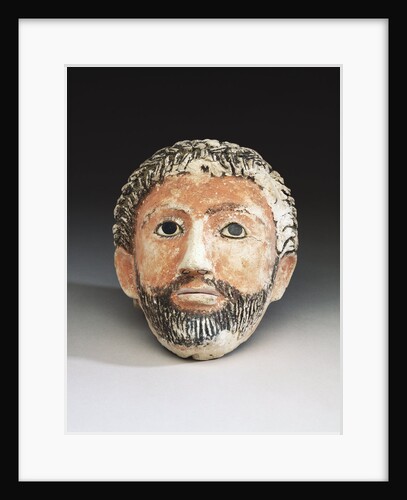 An Egyptian mummy mask of a man by Anonymous