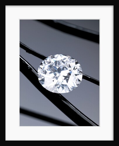 An unmounted circular-cut diamond weighing 50 carats by Anonymous