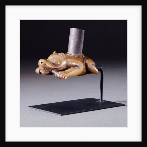 A fine Tlingit pipe of a crouching beaver holding a stick in its mouth by Anonymous