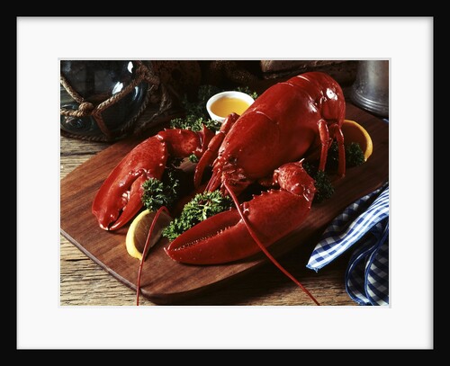 cooked Lobster On Wooden Platter With Lemon Wedge And Drawn Butter by Anonymous