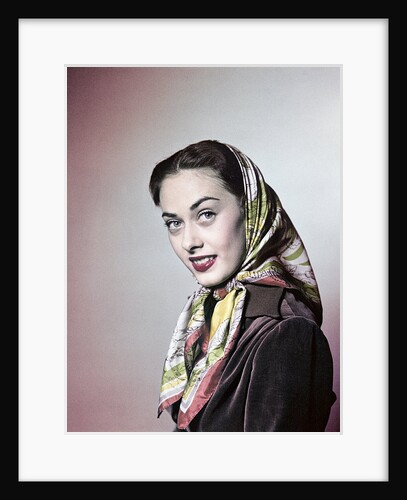 1950s Smiling Brunette Woman Wearing Silk Head Scarf Babushka Looking At Camera by Anonymous