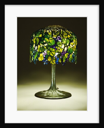 Tiffany Studios 'Grape' leaded glass and bronze table lamp by Anonymous