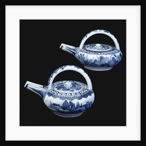 Two blue and white Arita ewers and covers by Anonymous