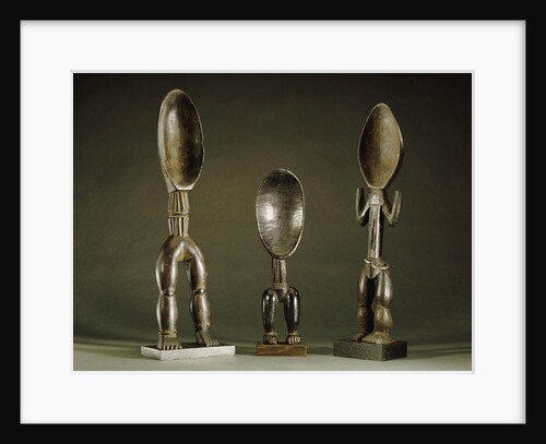 Three Dan spoons with elogated legs by Anonymous