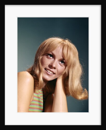 1960s Portrait Of Blond Woman Looking Up Long Hair Striped Top by Anonymous