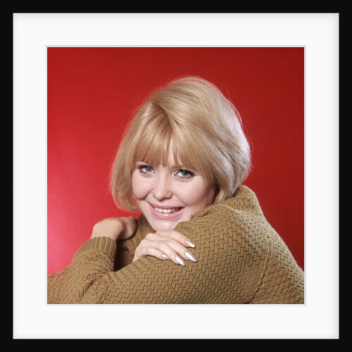 1960s Portrait Woman Blond Hair Gold Sweater Looking At Camera by Anonymous
