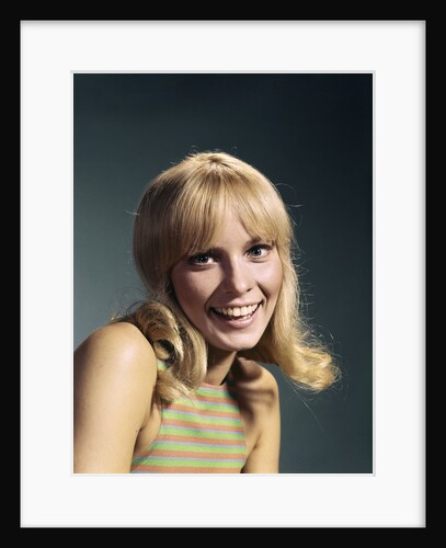 1960s Portrait Of Young Blond Woman Smiling Wearing Striped Sleeveless Top by Anonymous