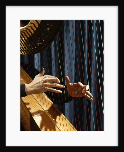 1960 1960s Retro Close Up Of Womans Hands Playing Harp Plucking Strings by Anonymous
