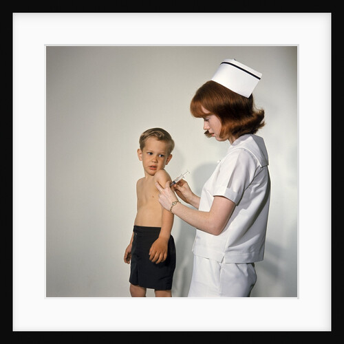 1960s Woman Nurse Give Injection Needle To Little Boy Arm Vaccine Vaccination Prevention Immunize Inoculate Medicine by Anonymous