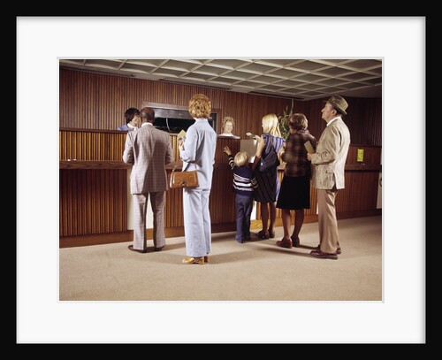 1970s Men Women Children Waiting In A Line In Bank For A Teller by Anonymous