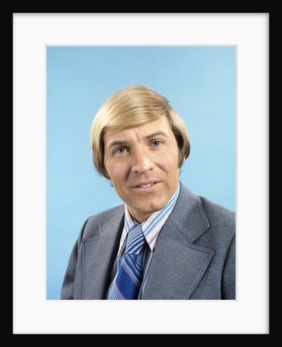 1970 1970s Retro Portrait Of Blonde Man Wearing Grey Suit Blue Striped Tie by Anonymous
