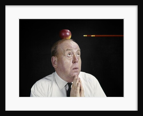 1960s Anxious Business Man Praying Looking Up At Arrow Heading Towards Apple Sitting On Top Of His Head by Anonymous