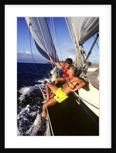 couple Enjoying The Ride On Deck Of Sailboat Heading Toward St. Vincent West Indies by Anonymous