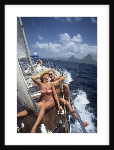 1990s Couple Sitting On Bow Of Sailboat Saint Lucia West Indies by Anonymous