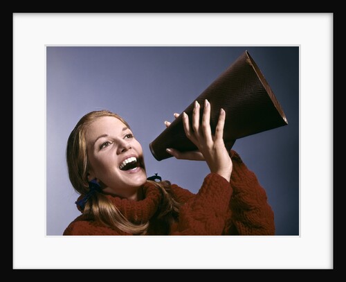 1960s Portrait Teen Cheerleader Girl Shouting Into Megaphone by Anonymous