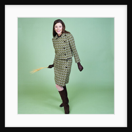 1960s Young Woman Modeling Green Wool Knit Two Piece Suit Fishnet Stockings Boots Full Length Clothes Retro by Anonymous