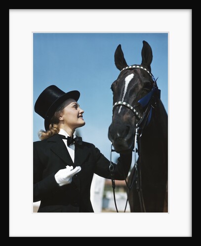 1940s 1950s Smiling Woman Wearing Top Hat Tuxedo White Gloves Holding Riding Crop Posing With Horse Blue Ribbon Winner by Anonymous