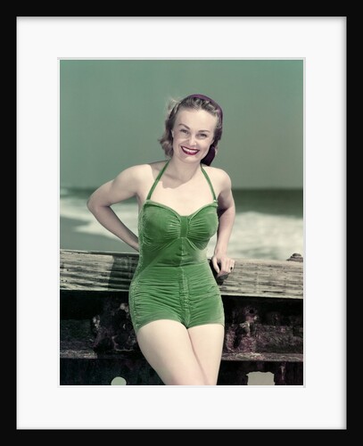1940s Portrait Smiling Woman Wearing Green Velvet Bathing Suit Posing Leaning On Diving Board by Anonymous
