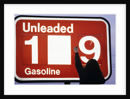1980s Anonymous Unidentified Person Changing Gasoline Prices Sign by Anonymous