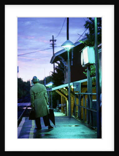 1970s 1980s Impatient Anonymous Man Waiting For Commuter Train by Anonymous