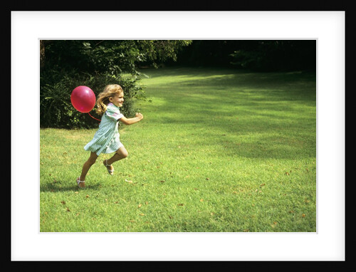 1980s Little Girl With A Red Balloon Running In The Grass by Anonymous