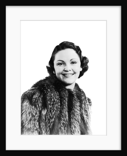 1930s 1940s Portrait Smiling Woman Wearing Fur Coat Looking At Camera by Anonymous