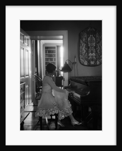 1920s Woman Pianist Sitting Playing Piano by Anonymous