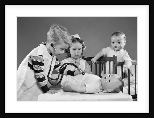 1950s Boy And Girl Playing Doctor And Nurse With Stethoscope And Dolls by Anonymous