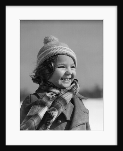 1930s Smiling Little Girl Wearing Winter Clothing Knit Hat Scarf And Coat by Anonymous