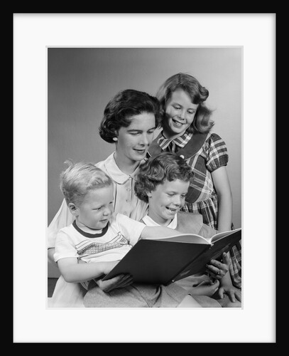 1950s Portrait Mother Two Daughters And Son Reading Book Together by Anonymous