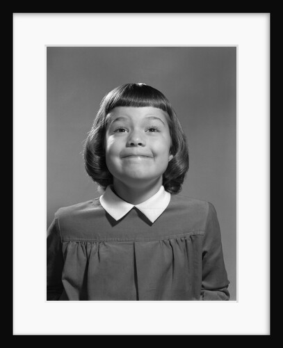 1950s Girl Page Boy Hair Bangs Smiling Funny Facial Expression Looking At Camera by Anonymous