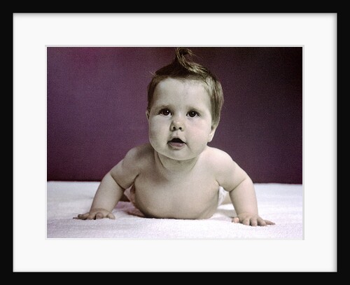 1940s 1950s Baby Raising Head Up Pushing With Arms Like Push Up Exercise by Anonymous