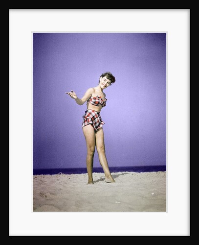 1940s 1950s Smiling Young Woman Wearing Plaid Two Piece Bathing Suit Standing On Beach Sand by Anonymous