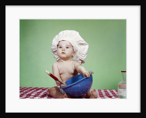 1960s Serious Baby In Chef Hat With Mixing Bowl And Spoon by Anonymous