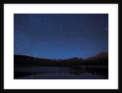 Star trails over a lake by Anonymous