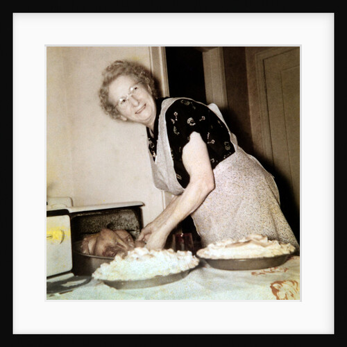 Grandma cooks in the kitchen, ca. 1952 by Anonymous